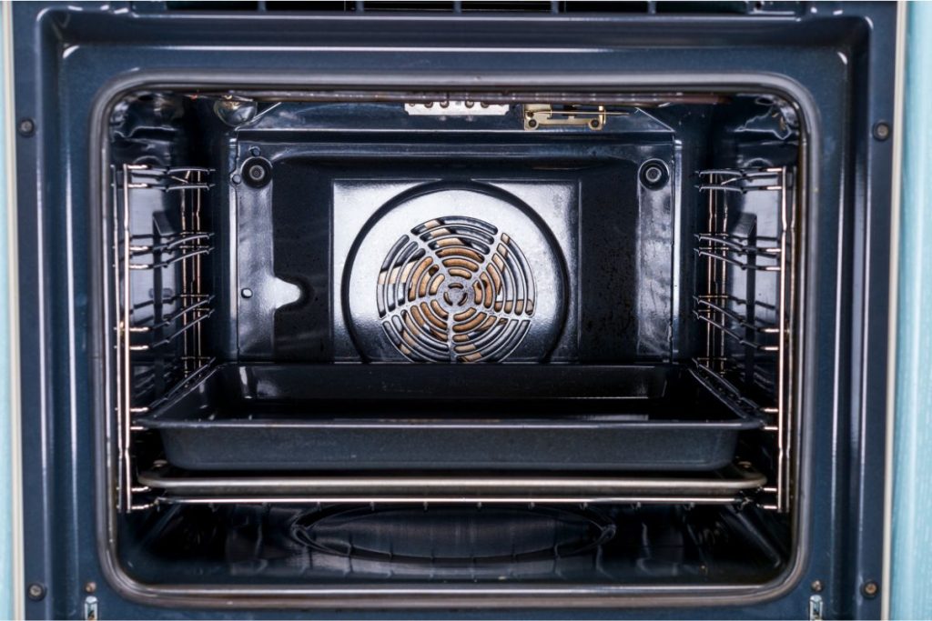 Inside a convection oven showing a fan at the back