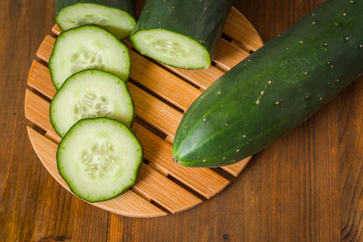 cucumber slices on wooden board