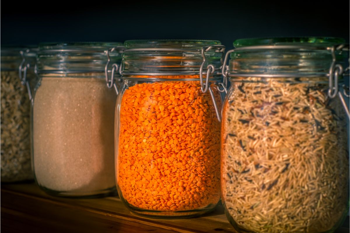beans rice and lentils in glass containers