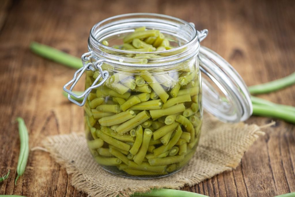 Cooked green beans in a canning jar