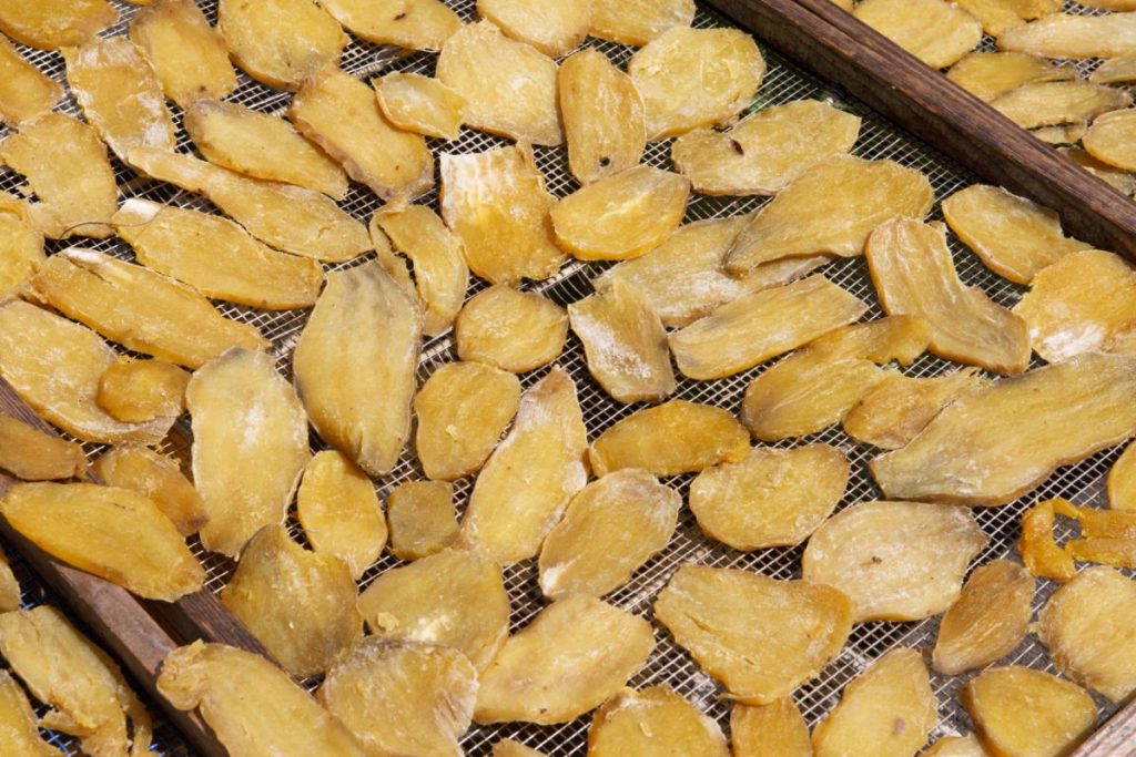 Pale yellow dried raw sweet potato pieces