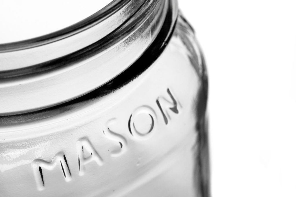 Up close photo showing mason logo on glass canning jar