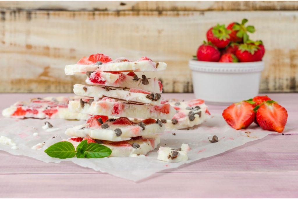 yogurt sheets broken into pieces with strawberries and chocolate chips