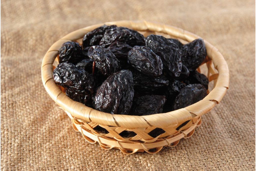 Whole prunes in a basket