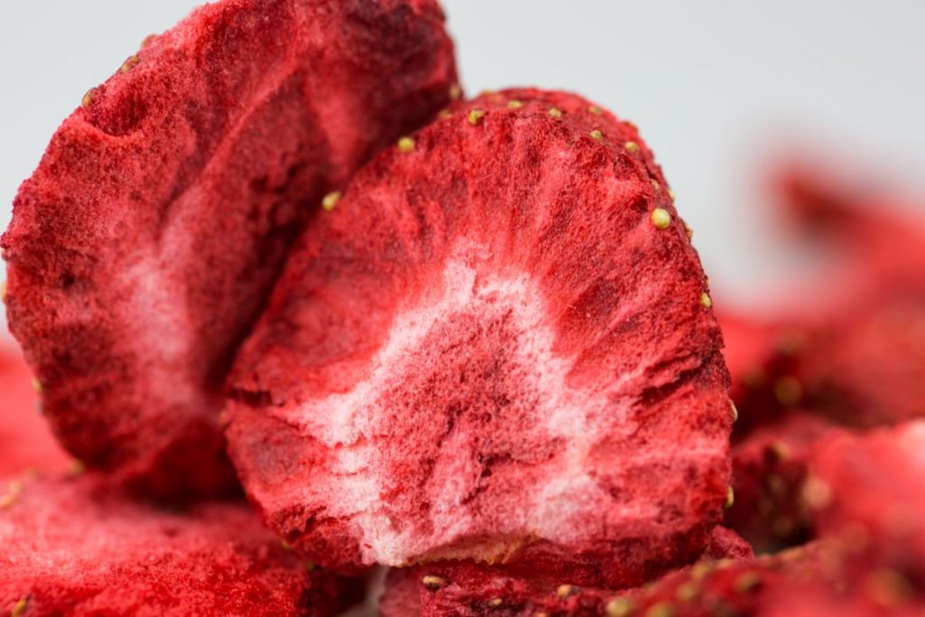 Up close photo of a sliced freeze-dried strawberry