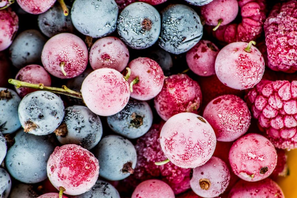 Mix of frozen berries including cherries, raspberries, and blueberries