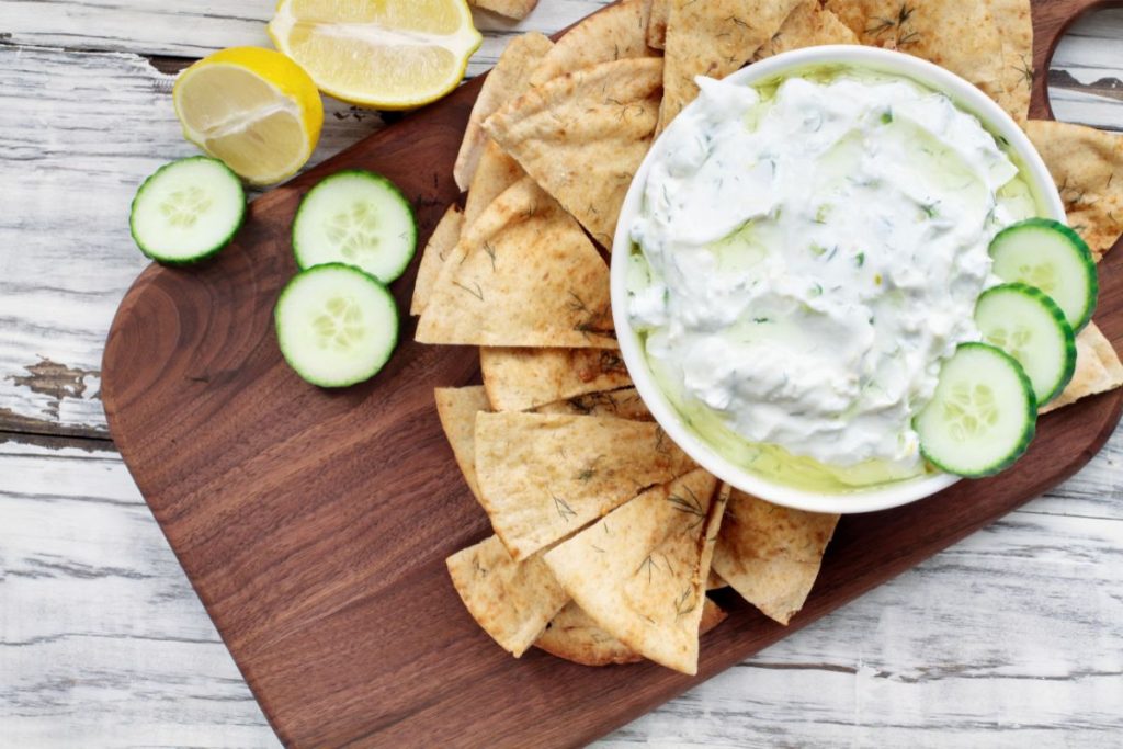 Tzatziki dip with cucumber chips and pita chips