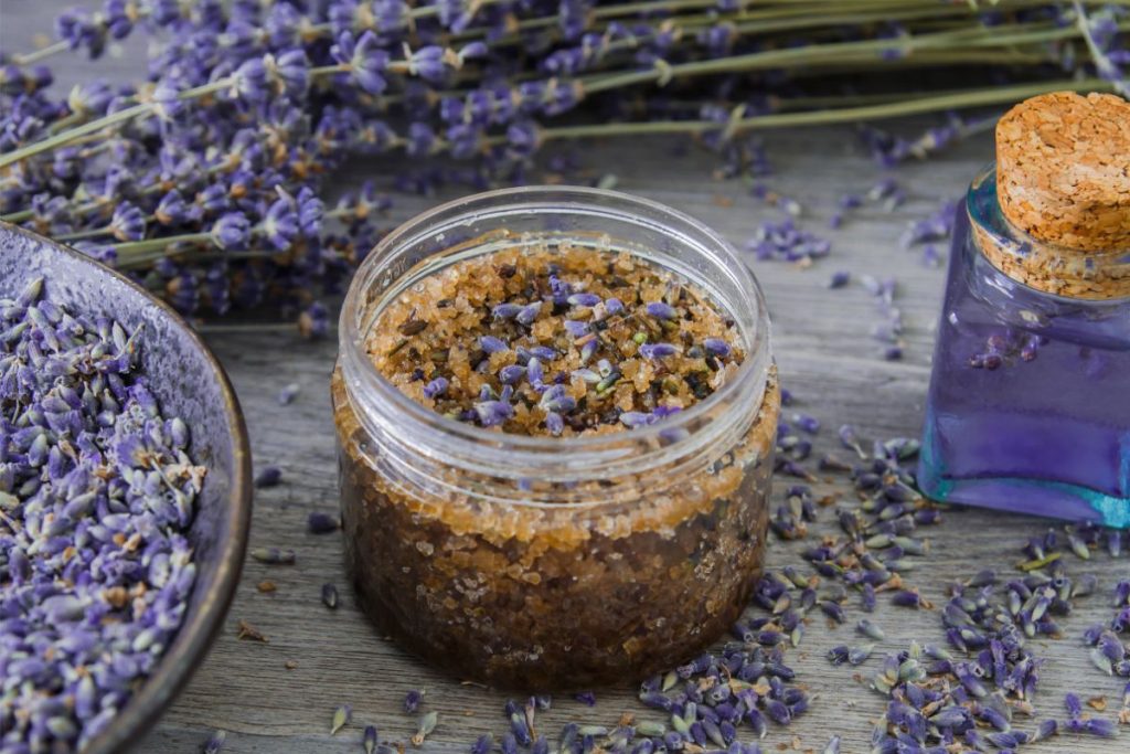 Jar of lavender bath salts made with dried stems and buds