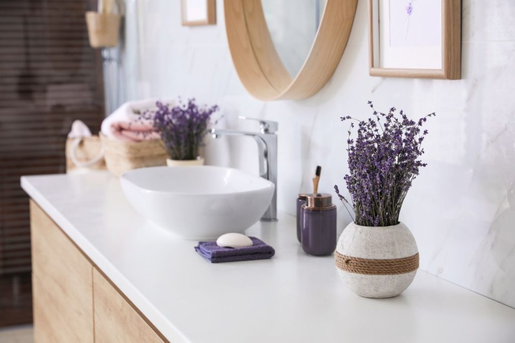 Bathroom with lavender bouquets in pots