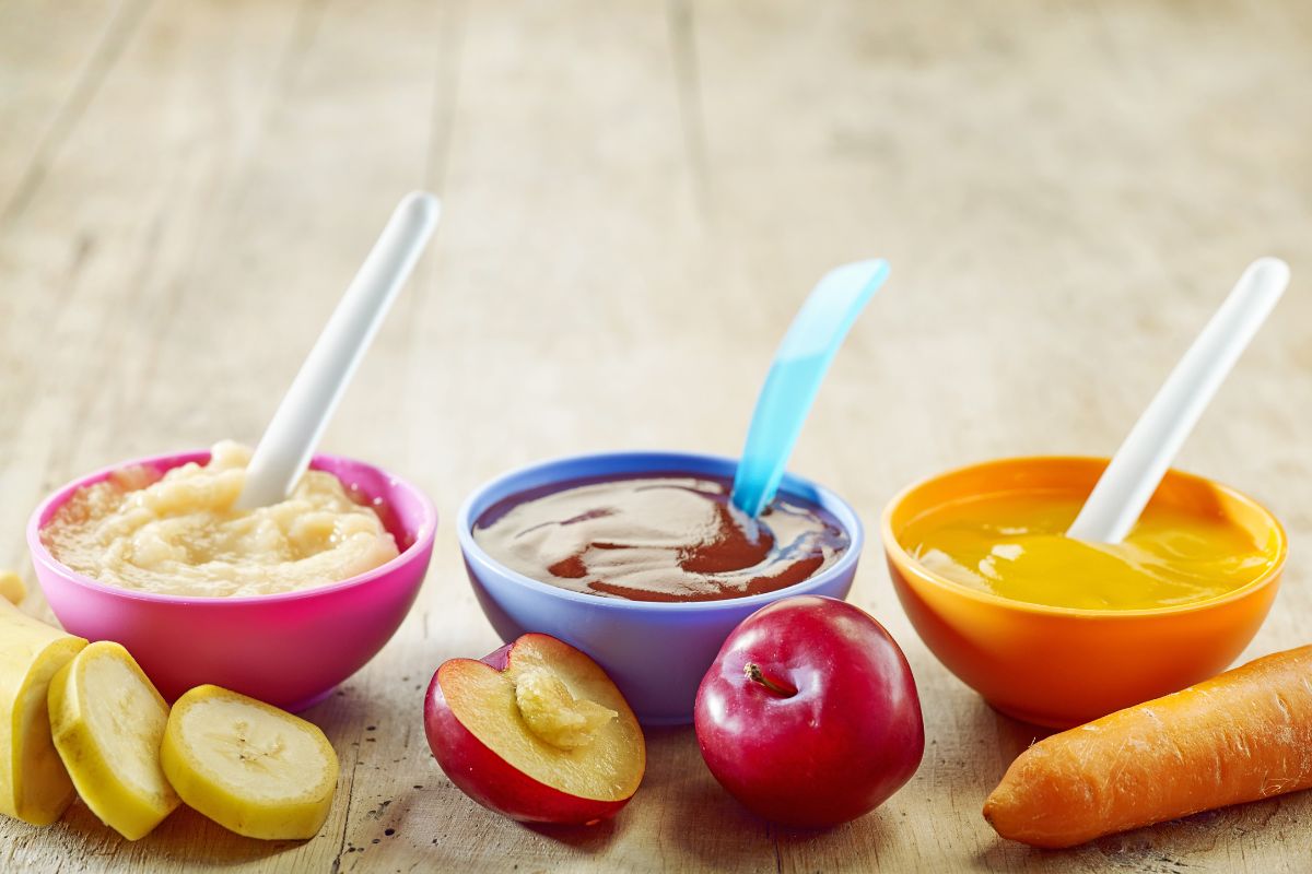 Three bowls of fruit and vegetable baby food