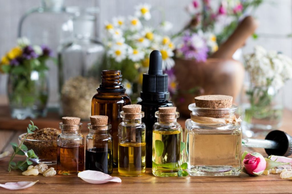 Several bottles of different types of infused floral oils